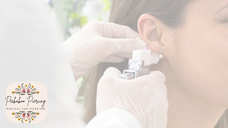 A professional RN travel nurse wearing sterile gloves performs a medical ear piercing on a client's ear lobe piercing site using a hand-pressure instrument, illustrating the debate of needle vs. piercing gun safety during a mobile travel piercing appointment.